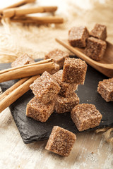 brown sugar cubes with cinnamon sticks