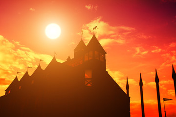 Silhouette of castle at sunset