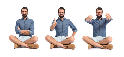 Obraz premium Young hipster man with thumb up
