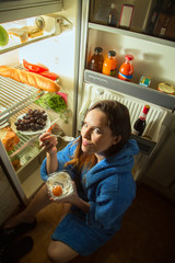 woman eating dessert