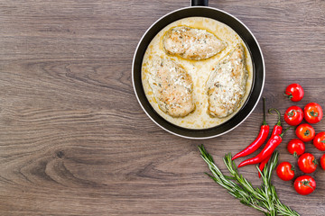 Chicken breast in cream sauce.