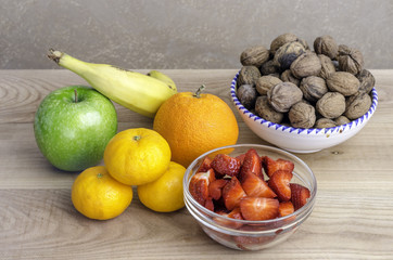 Naklejka na ściany i meble Set of fruits, tangerines, banana, apple, orange, walnuts