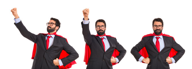 Businessman dressed like superhero © luismolinero