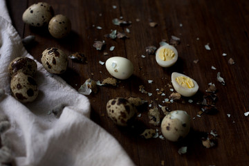 Fototapeta na wymiar fresh and boiled quail eggs from a farmers market in rustic