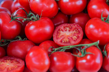 Red tomatoes background. Group of tomatoes