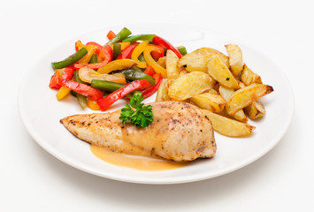 Hähnchenbrust mit Röstkartoffeln und Paprikagemüse