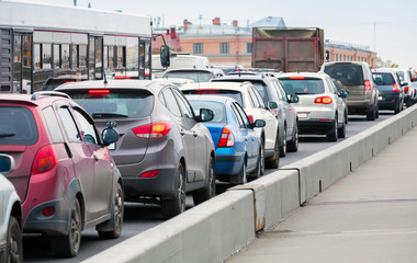 Cars in a traffic jam on the big city street