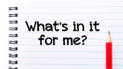What Is in it for me Text written on notebook page