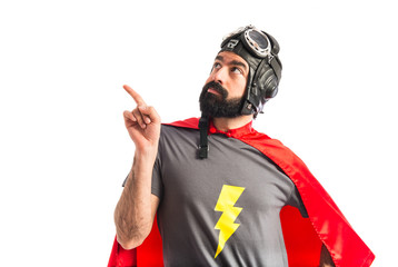 Obraz premium Superhero pointing up