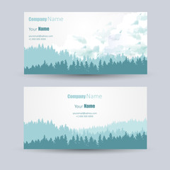 Business cards design with pine forest background 