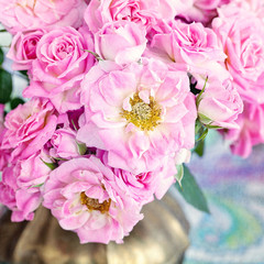 floral composition with a pink roses .
