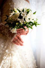 bride with bouquet of flowers