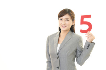 数字を持つビジネスウーマン