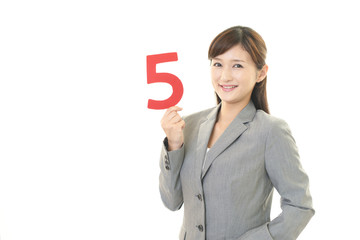 数字を持つビジネスウーマン