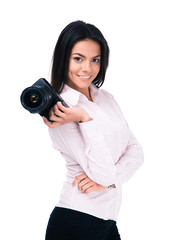 Smiling woman photographer holding camera