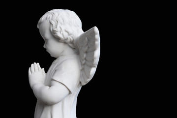 Guardian angel on black background with copy space Concept of faith and religion