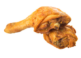 Deep fried chicken drumsticks over white background