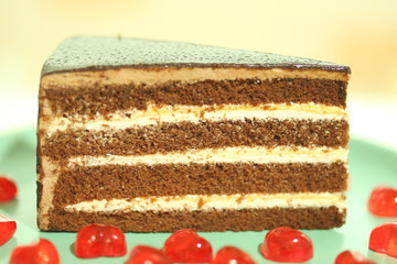 cake chocolate and jelly red heart are piece place on plate isol