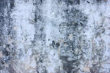 Textured walls with dirt.