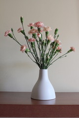 Simple composition of pastel color carnation