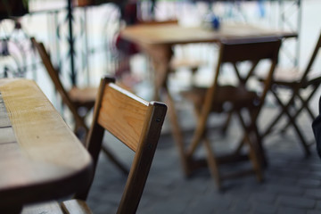 tables and chairs in the bar at low depth of field