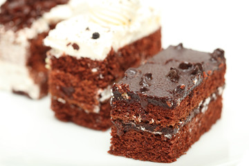Obraz na płótnie Canvas chocolate cake sweet food closeup isolated white background