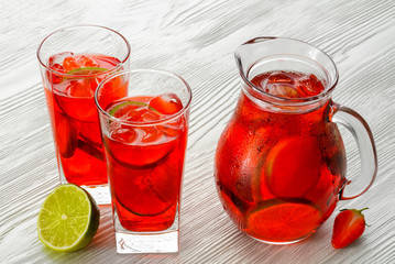 Coctail. Refreshing summer drink with Strawberry in jug and