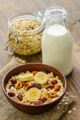 Healthy breakfast - whole grain muesli with a banana and nuts