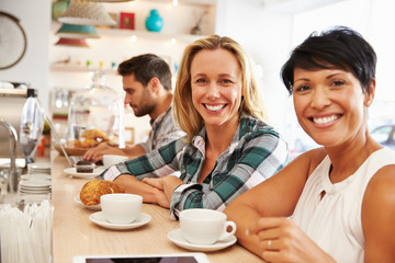 Two women meeting together in a cafe
