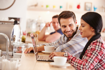 Young adults in a cafe