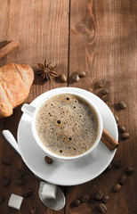 cup of coffee on wood