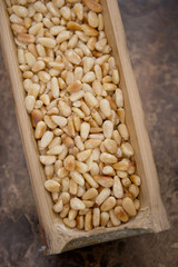 dry nuts in bamboo tube