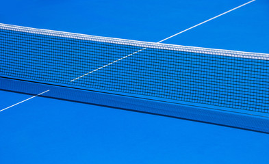 Table and grid for playing table tennis