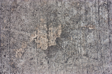 Textured walls with dirt.