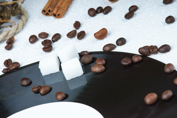 Sugar cubes and coffee beans