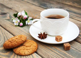 Cup of coffee and oatmeal cookies