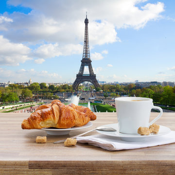 cup of coffee with croissant in Paris, France