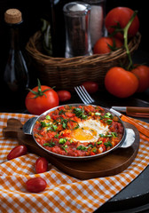 Shakshuka with tomatoes and eggs