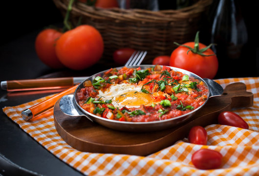 Shakshuka with tomatoes and eggs