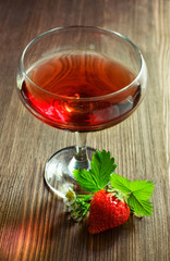 Red beverage with strawberries