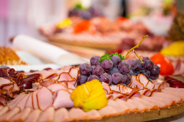 Choice of smoked ham and sausages on the table