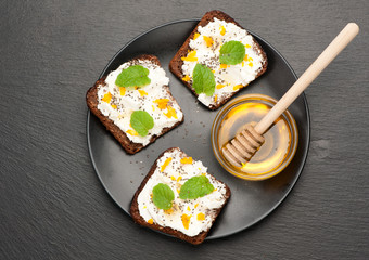 bruschetta with goat cheese, honey and chia seeds. top view