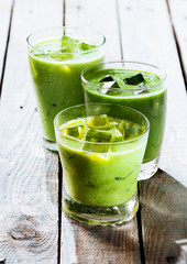Healthy Green Smoothie Shakes in Drinking Glasses