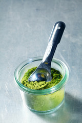 Jar of matcha powder