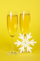 Glasses with champagne and snowflake