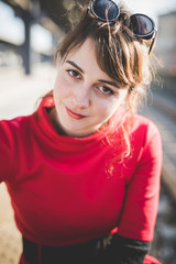 young beautiful red dressed vintage hipster woman