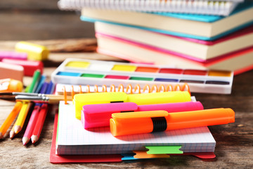 Fototapeta premium Bright school stationery on old wooden table