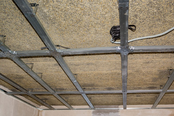 frame of suspended ceiling, electrical wiring and fiberboard