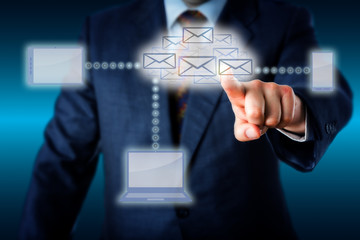 Manager Touching A Host Of Emails In Cloud Network