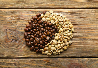 Coffee beans on wooden background